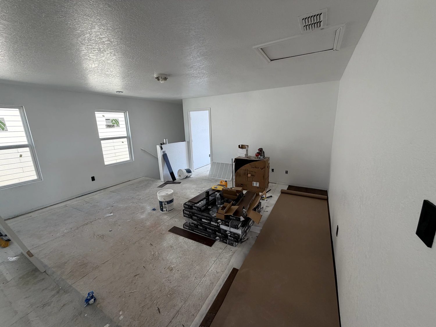 Patched, unpainted walls before painting