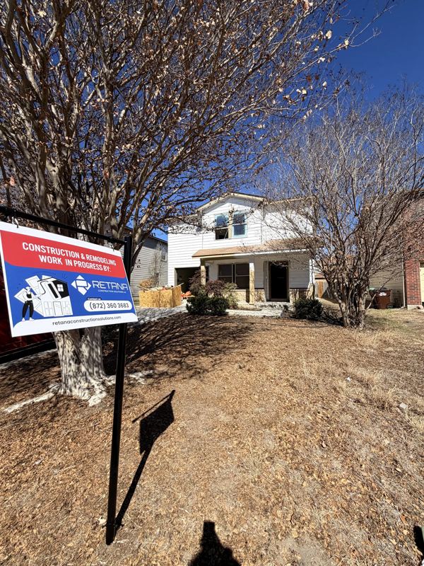 Jobsite with Retana Construction Solutions sign
